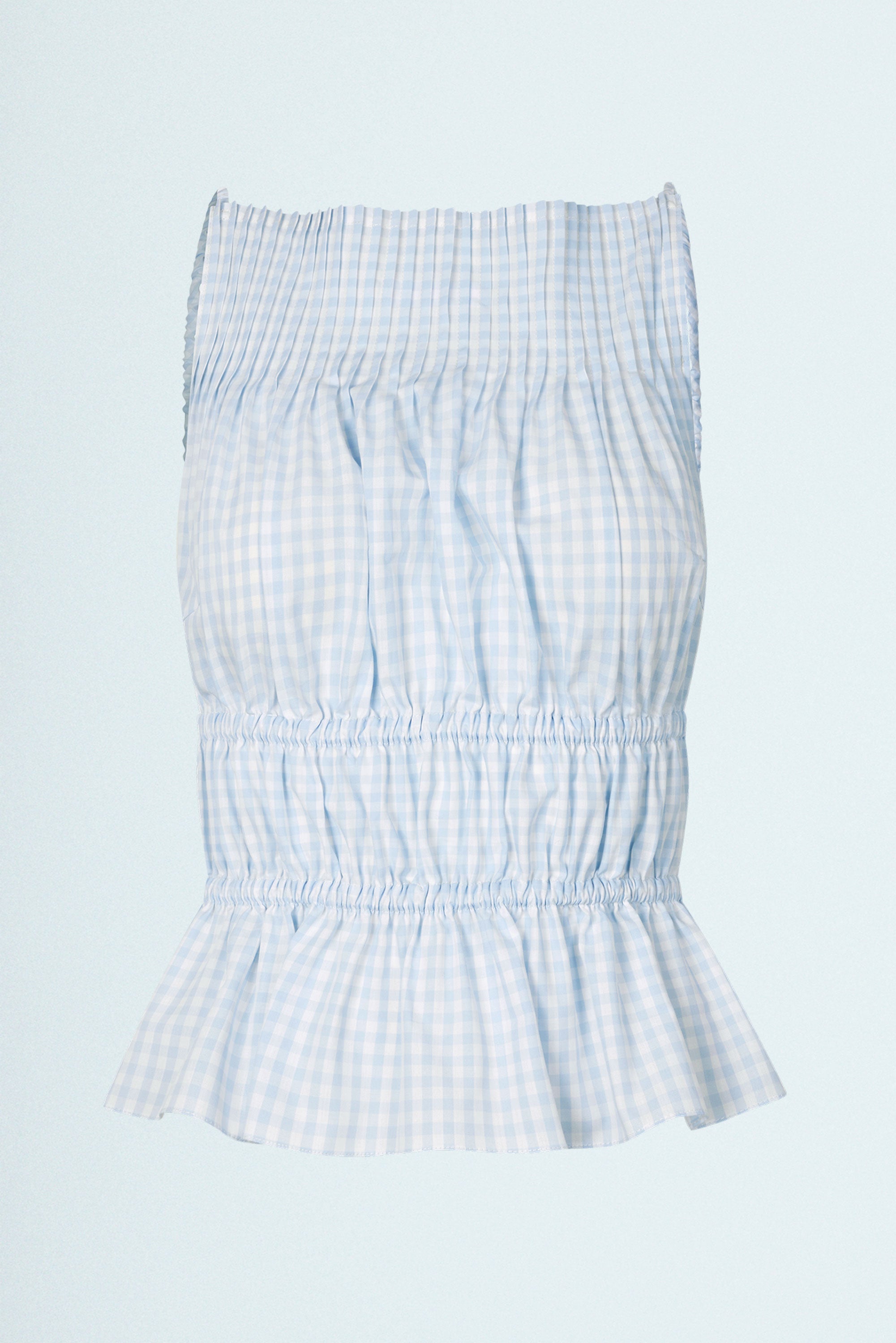 LINÉ Pintuck Top Blue. Pintucks at neckline · Elastic shoulder straps · Elastic casing under the bust and around the waist · Low back · The back hem is slightly elongated and is separated from the front by a small slit in the side seams · Model is 162 cm and wears size 1 · Made-to-order · Produced locally in Denmark · Material: 100 % organic cotton yarn dyed gingham · Collection: Gingham Garments. LINÉ